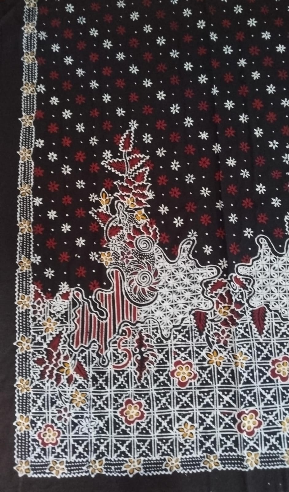 Motif batik tulis Turumtum silang